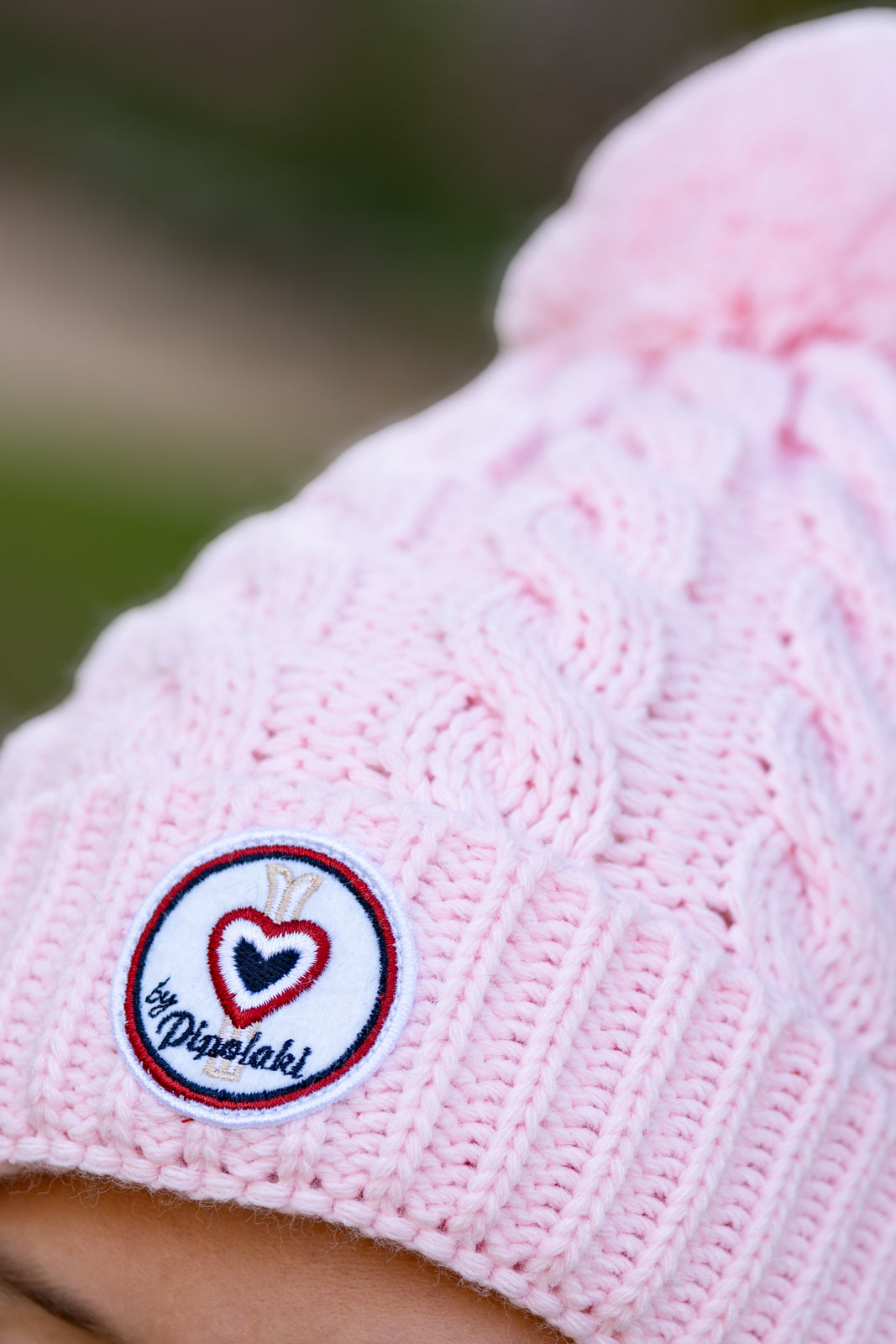 Bonnet pompom rose pâle