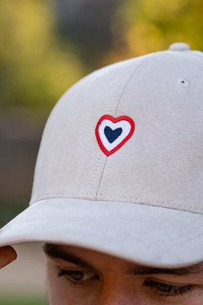 Casquette peau de pêche sable